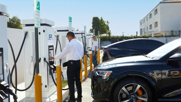 2 ev cars at a ChargeTronix charging station.